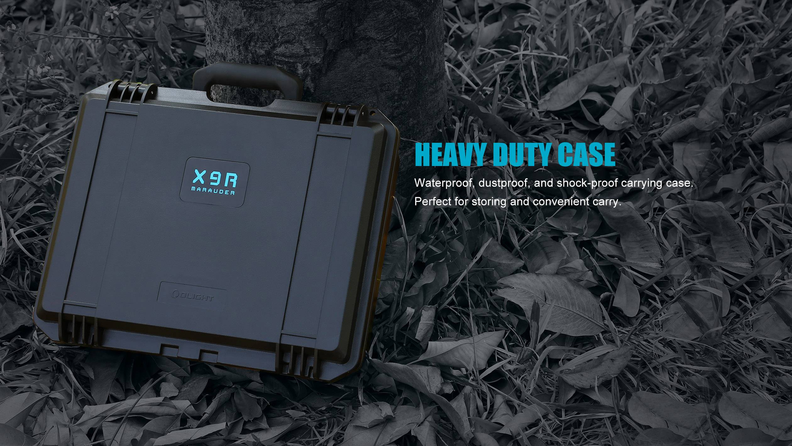 A robust black suitcase lies in the grass. The text beside it describes it as water-resistant, dust-proof, and shock-resistant, ideal for transportation.