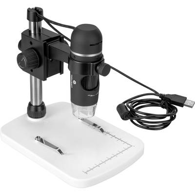 Digital microscope on a white base with ruler markings, connected via a USB cable.
