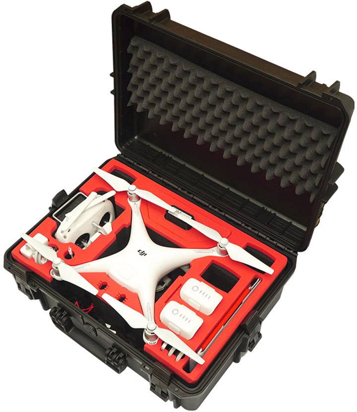 A white drone lies in a black hard-shell case with red foam lining, surrounded by accessories and spare parts.