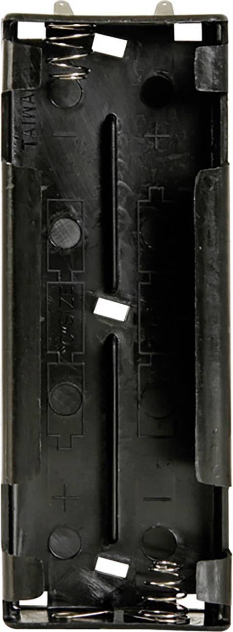 Black battery compartment for two AA batteries with spring contacts at both ends.