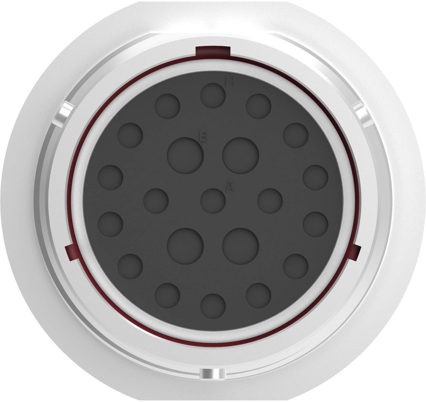 Round white device with a black centre and several concentric circles. Possibly a technological or mechanical component.