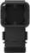 A black, rectangular adapter with a straight plug connection and rounded edges. Surface recesses and grooves visible.