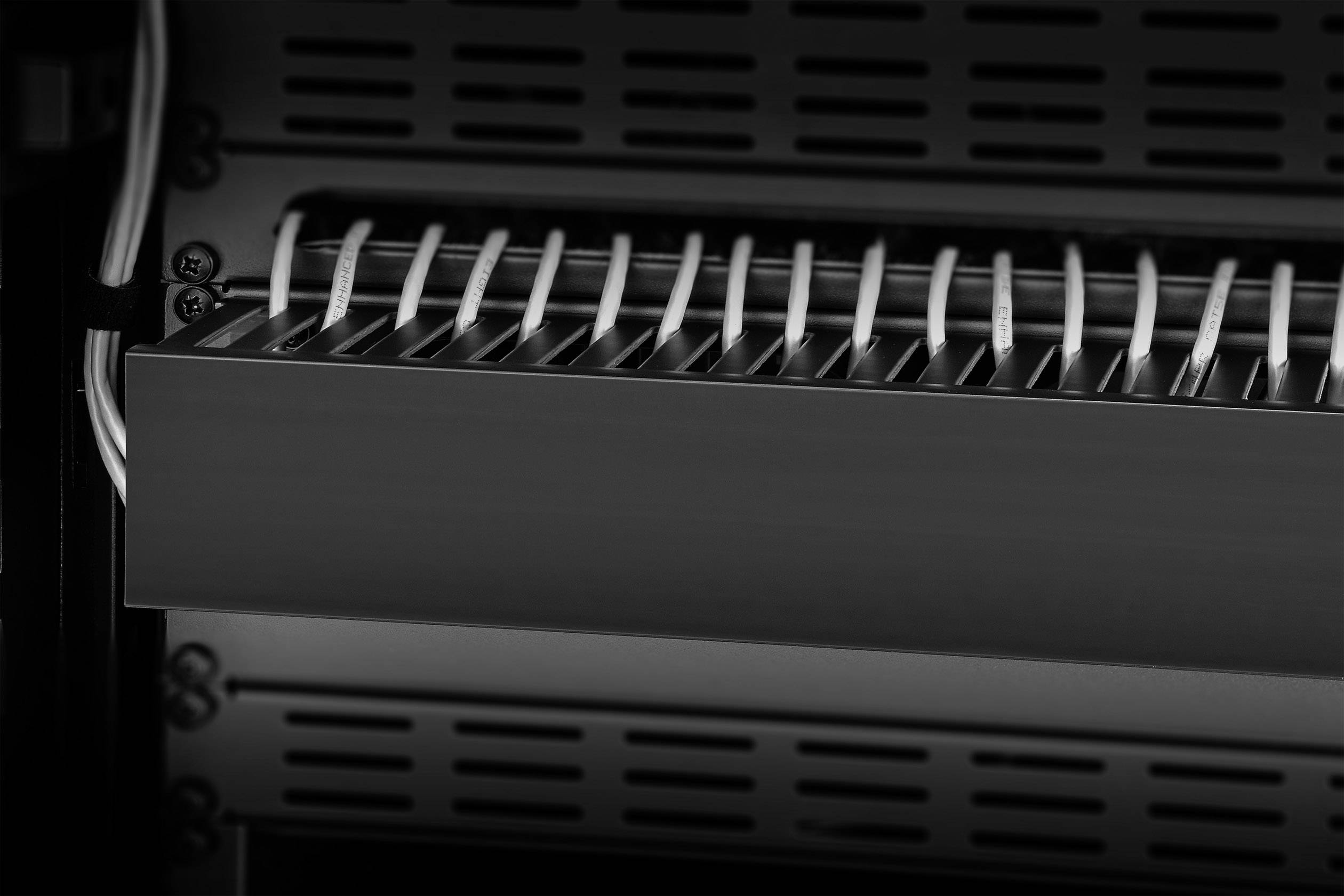 An open fireplace with a grill rack inside.