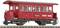 Red railway carriage with the inscription 'Zillertalbahn' and 'Ried Municipality', standing on the track.