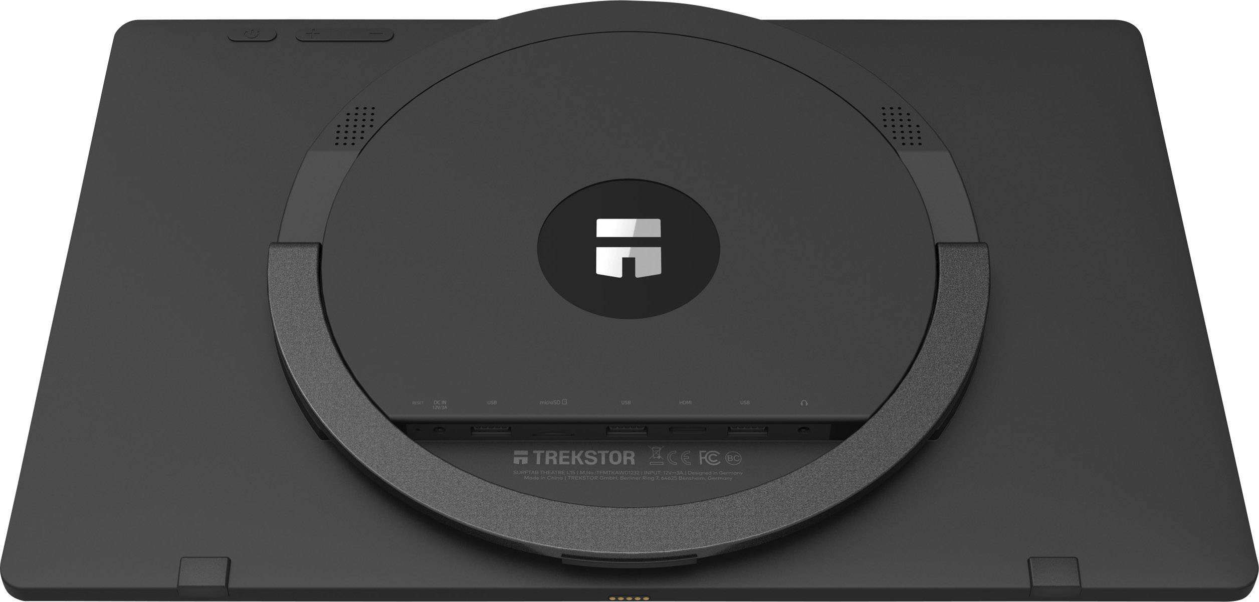 'Rear view of a black tablet with a circular stand in the centre and company logo. TrekStor branding visible.'