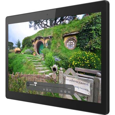 A green-covered hobbit house in a hilly landscape with a round doorframe and small windows; an idyllic, fairytale-like setting.