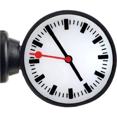 A round station clock with a white dial, black hour and minute markings, and red hands pointing to four o'clock.