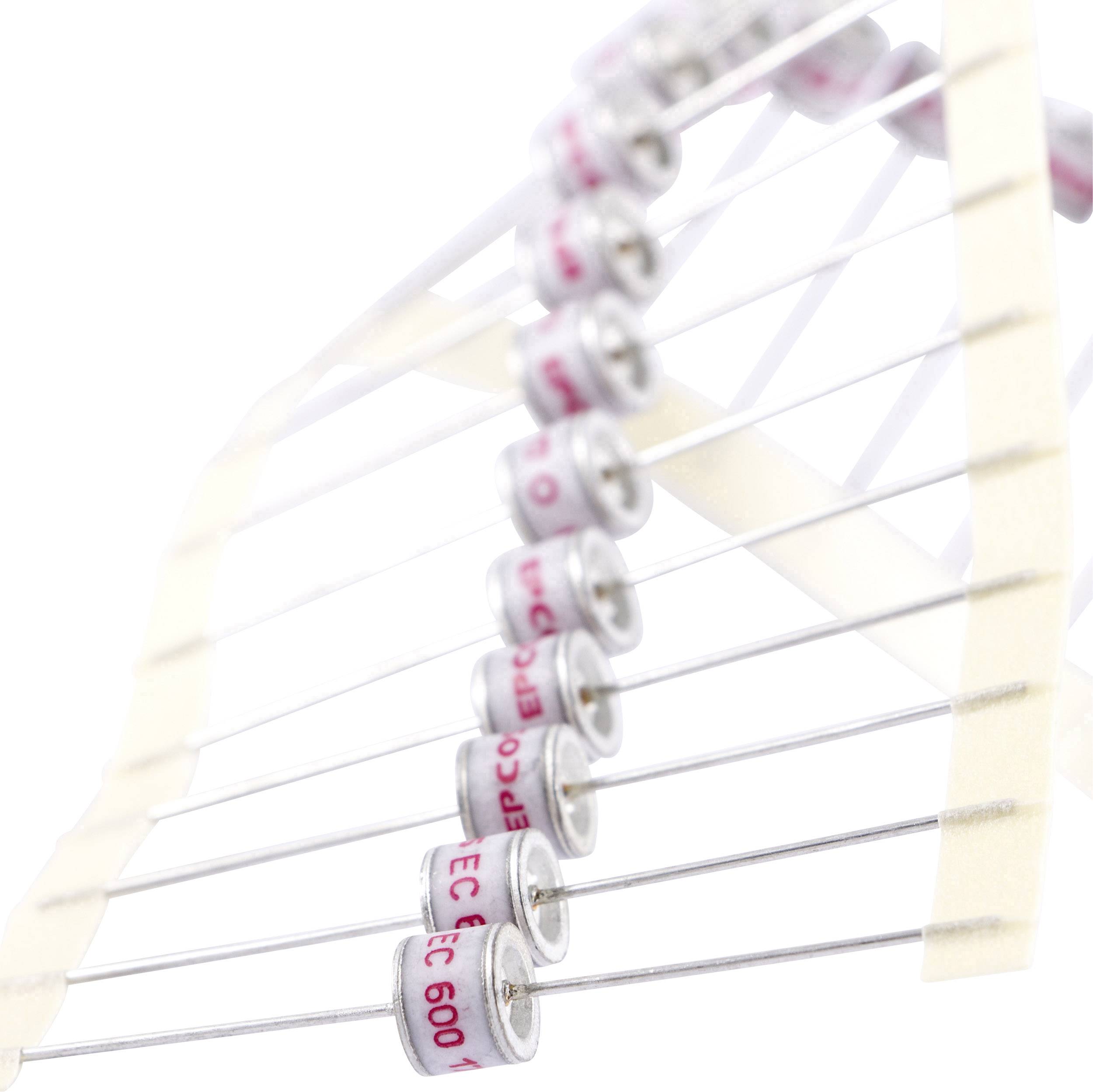 Several silver diodes are fixed in a row, connected by wires and with red markings on the surface.