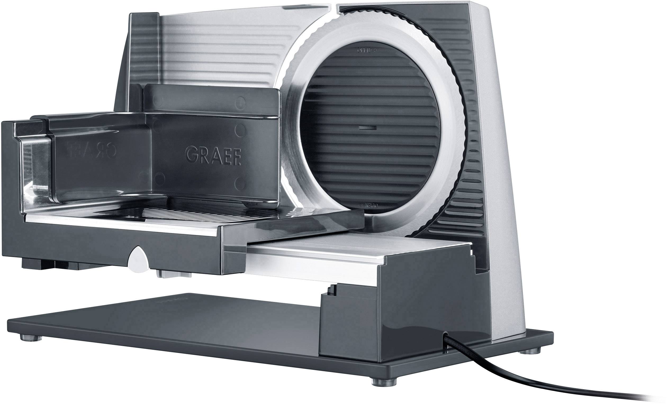 Electric all-purpose slicer machine with a metal casing. It features a round, serrated cutting mechanism and a power cable.