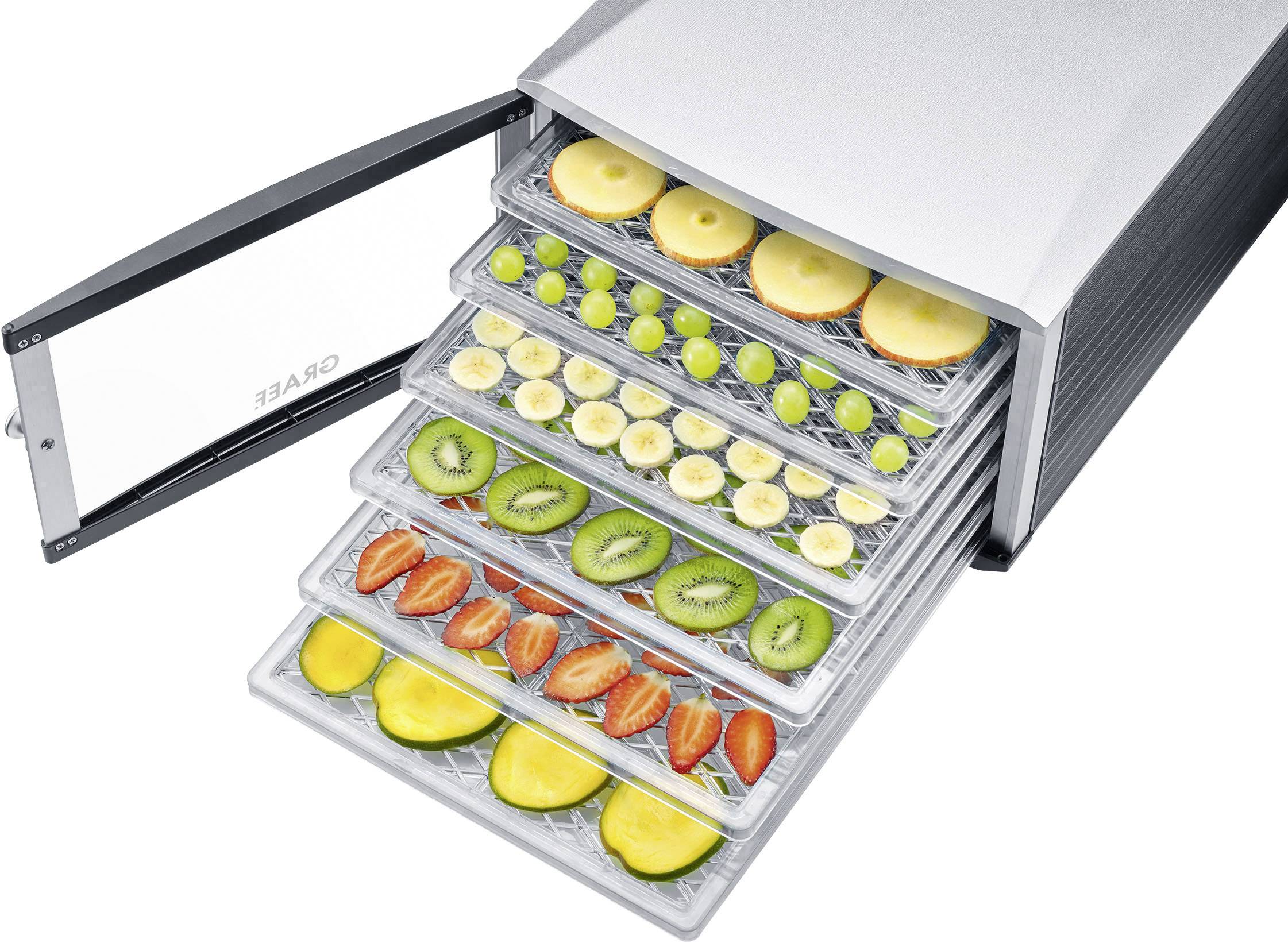 A dehydrator with multiple drawers displays sliced fruits such as apples, bananas, grapes, kiwis, strawberries and mangoes.