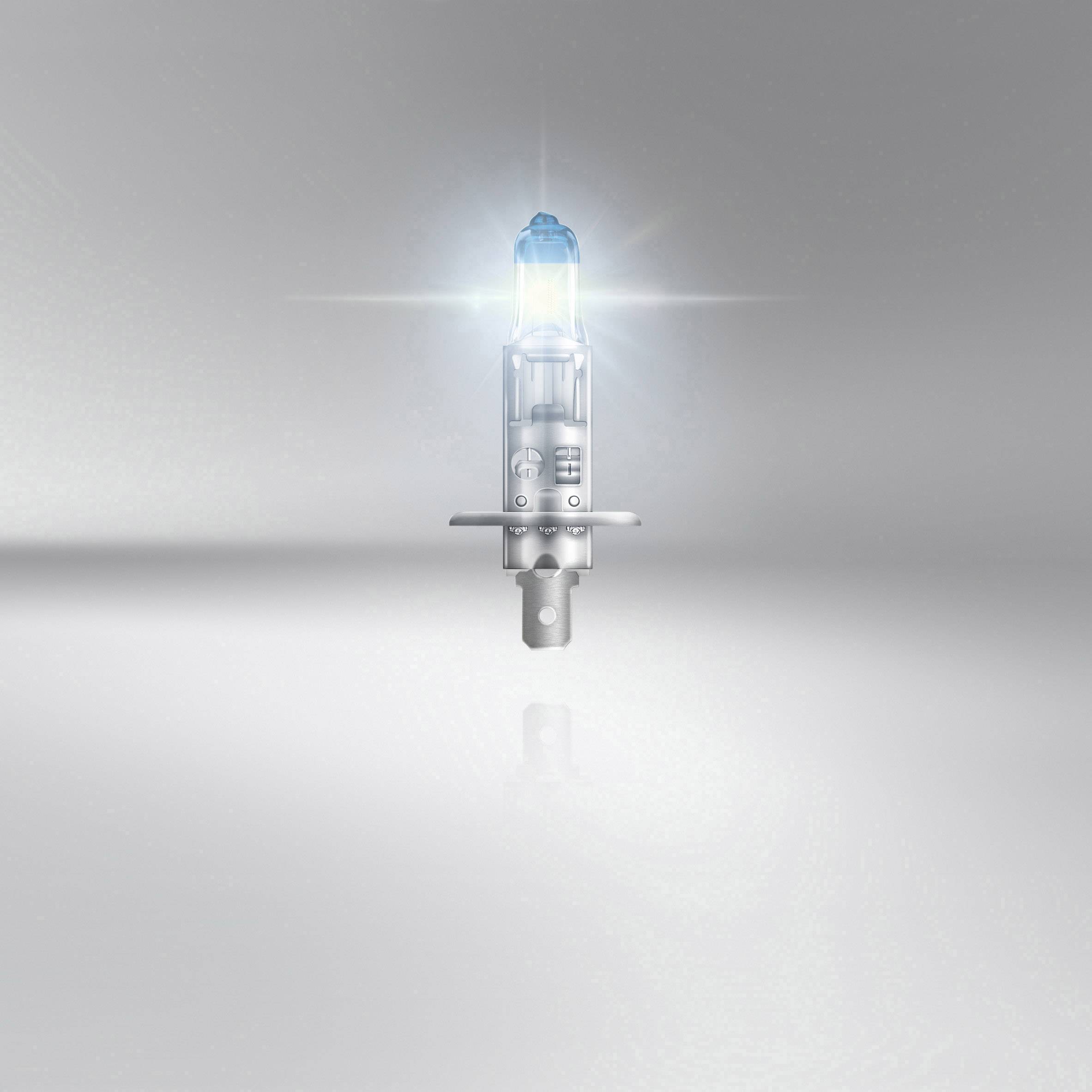 A single halogen lamp on a grey background, surrounded by a radiant light glow.