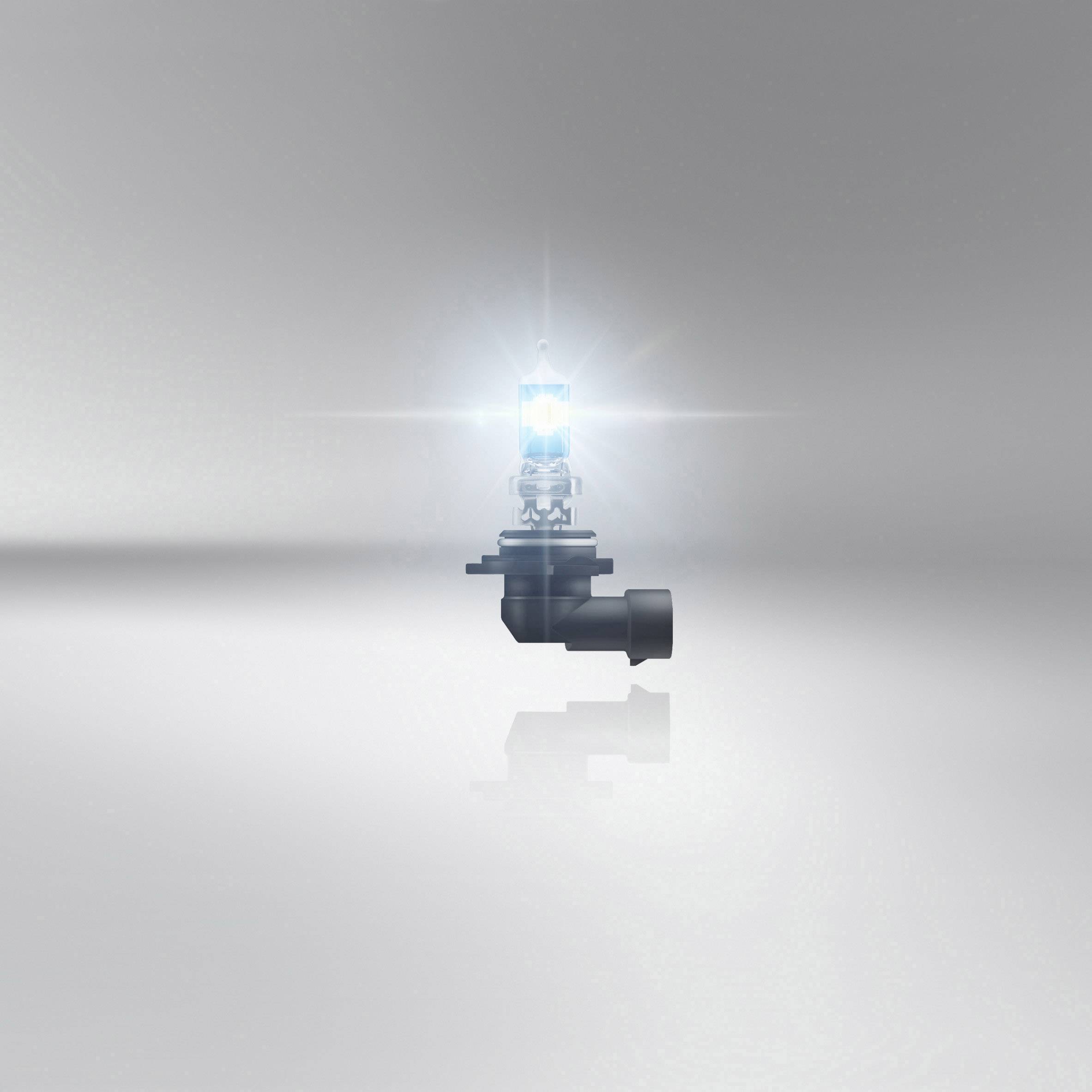 A radiant light bulb hovers in front of a grey background. It emits bright light that is reflected in all directions.