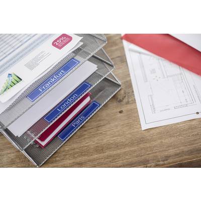 Office organisation on a desk with three trays labelled "Frankfurt", "London" and "Paris", with building plans beside them.