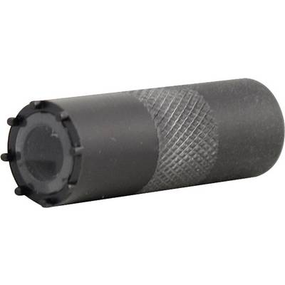 A black cylindrical metal pin with a ribbed pattern and a smooth end is resting on a white surface.