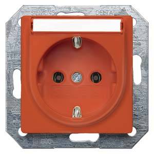A red earthed socket by Siemens, mounted on a metal plate. It is suitable for connecting electrical devices.