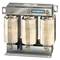 'Siemens choke coil with three windings. Metal enclosure with visible connections. Used for reducing electrical interference.'