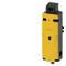 A yellow safety limit switch with a black housing, mounted for industrial applications to monitor machine positions.