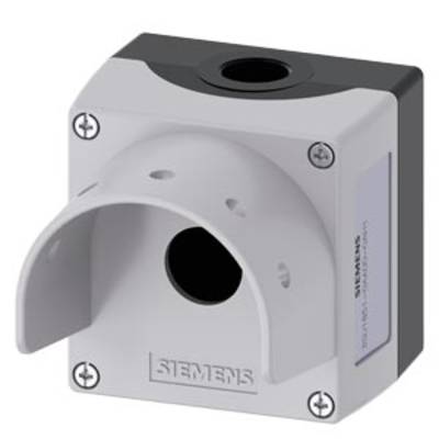 A rectangular housing made of grey plastic with a rounded mounting bracket and screws at each corner. There is an opening on the top.