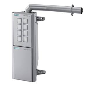 Grey industrial control panel with square control elements and hose connection in the top right corner.