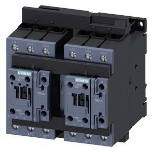 Industrial contactor with several blue switches and connections, used for controlling electrical equipment in industrial applications.