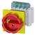 A red safety rotary switch on a yellow background, possibly for controlling electrical equipment.
