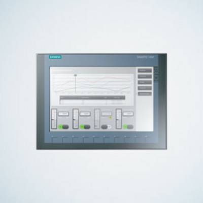 A Siemens SIMATIC HMI panel displays a user interface with diagrams and control elements for monitoring and controlling processes.