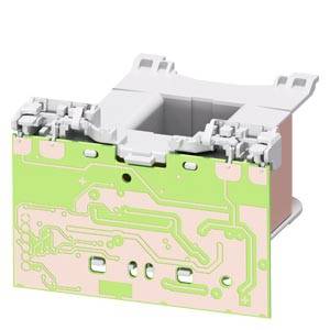 A white plastic component with a green circuit board displays a complex electrical circuit, potentially part of an electronic device.
