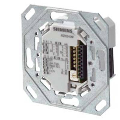 A wall-mounted electric switch with a metal frame and visible connections. 'Siemens' brand name printed at the top of the device.