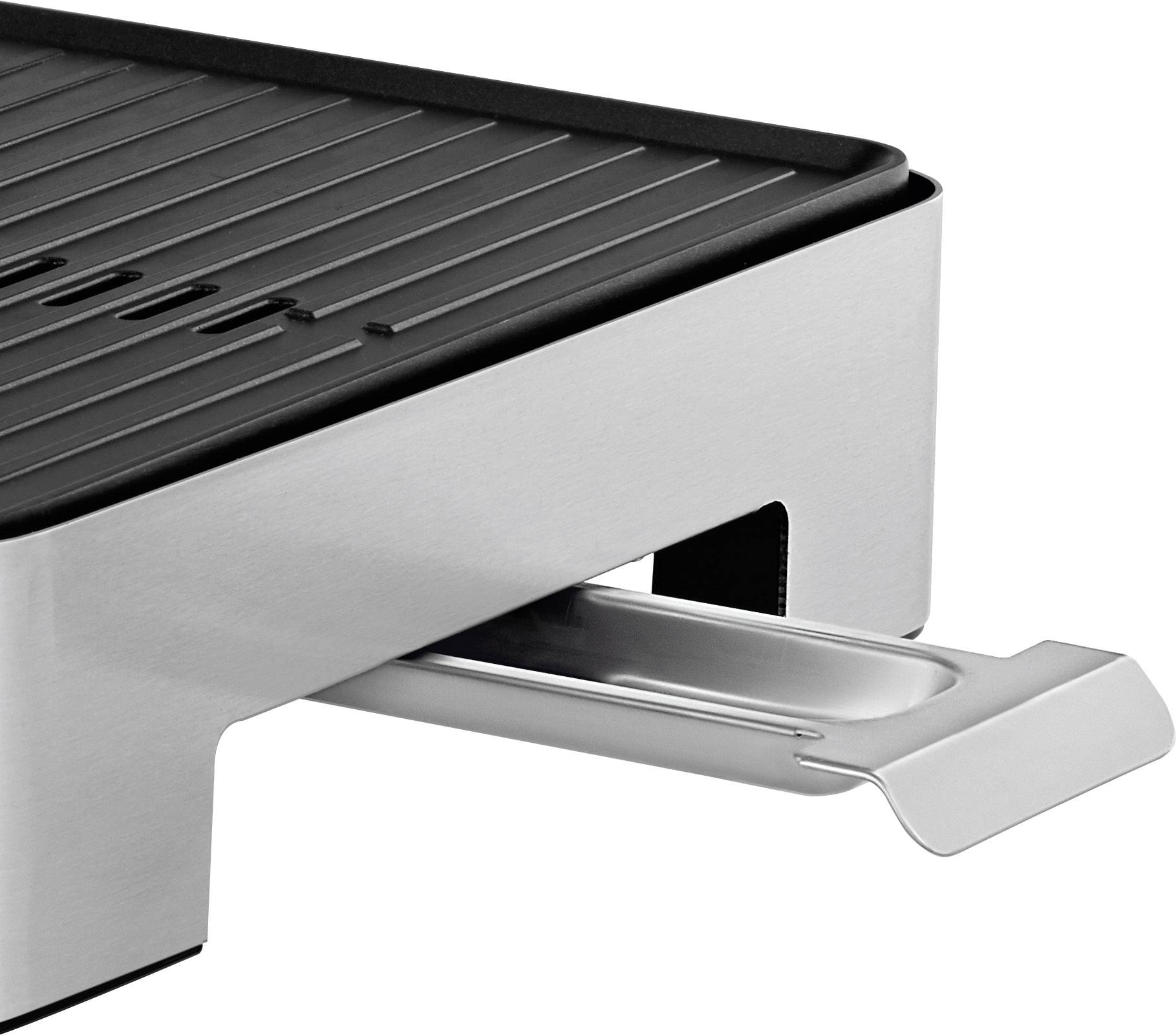 An electric grill with a removable stainless steel drip tray underneath, shown in an angled view.