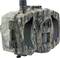 Camouflage-coloured trail camera with lens and motion sensor, suitable for monitoring wildlife in natural habitats.