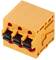 An orange-coloured, three-pin plug connector block used for electrically connecting multiple wires.