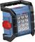 Blue-black work light with LED lamps, red switch and handle. Brand name visible at the front. Suitable for construction sites.