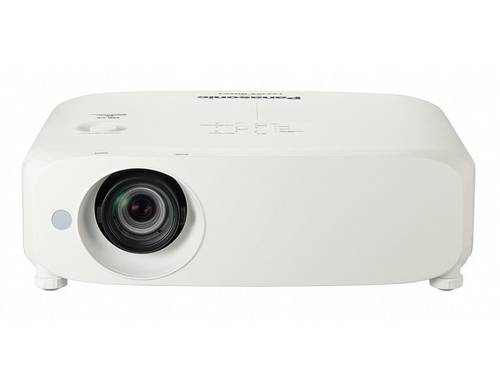 A white projector with a large lens, positioned on a white surface, centrally and frontally visible in the image.