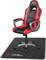 Gaming chair in black and red with armrests on a black carpet with the 'Trust Gaming' logo.