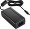 Glossy black power supply with cable and plug, suitable for electronic devices.