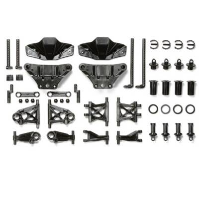 Black plastic parts in various shapes and sizes, symmetrically arranged, presumably construction or replacement parts for model building.