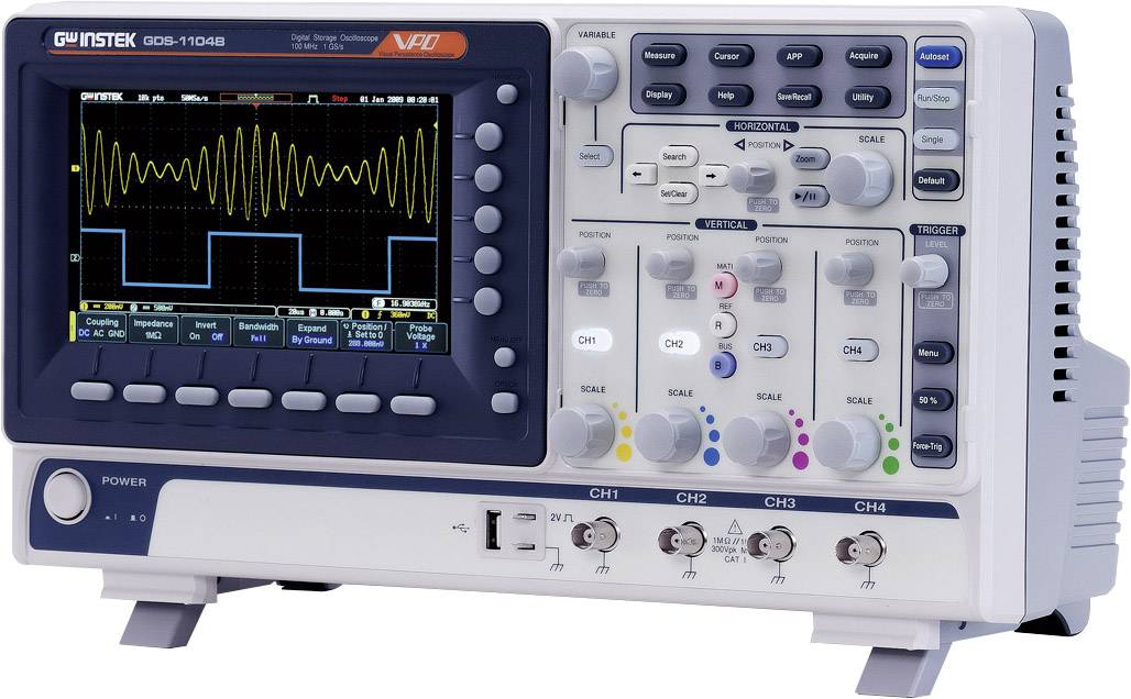 A digital oscilloscope displays a waveform signal on the screen with multiple buttons and controls for adjustments.