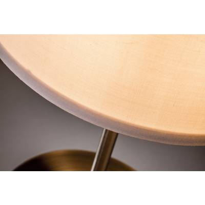A partial view of a round wooden table, standing on a slim metallic base, against a grey background.
