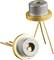 Two electronic components with three thin metal legs and a round, silver casing mounted on a golden base.