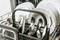 A fully loaded dishwasher with clean crockery and cutlery, ready to be unloaded after a wash cycle.