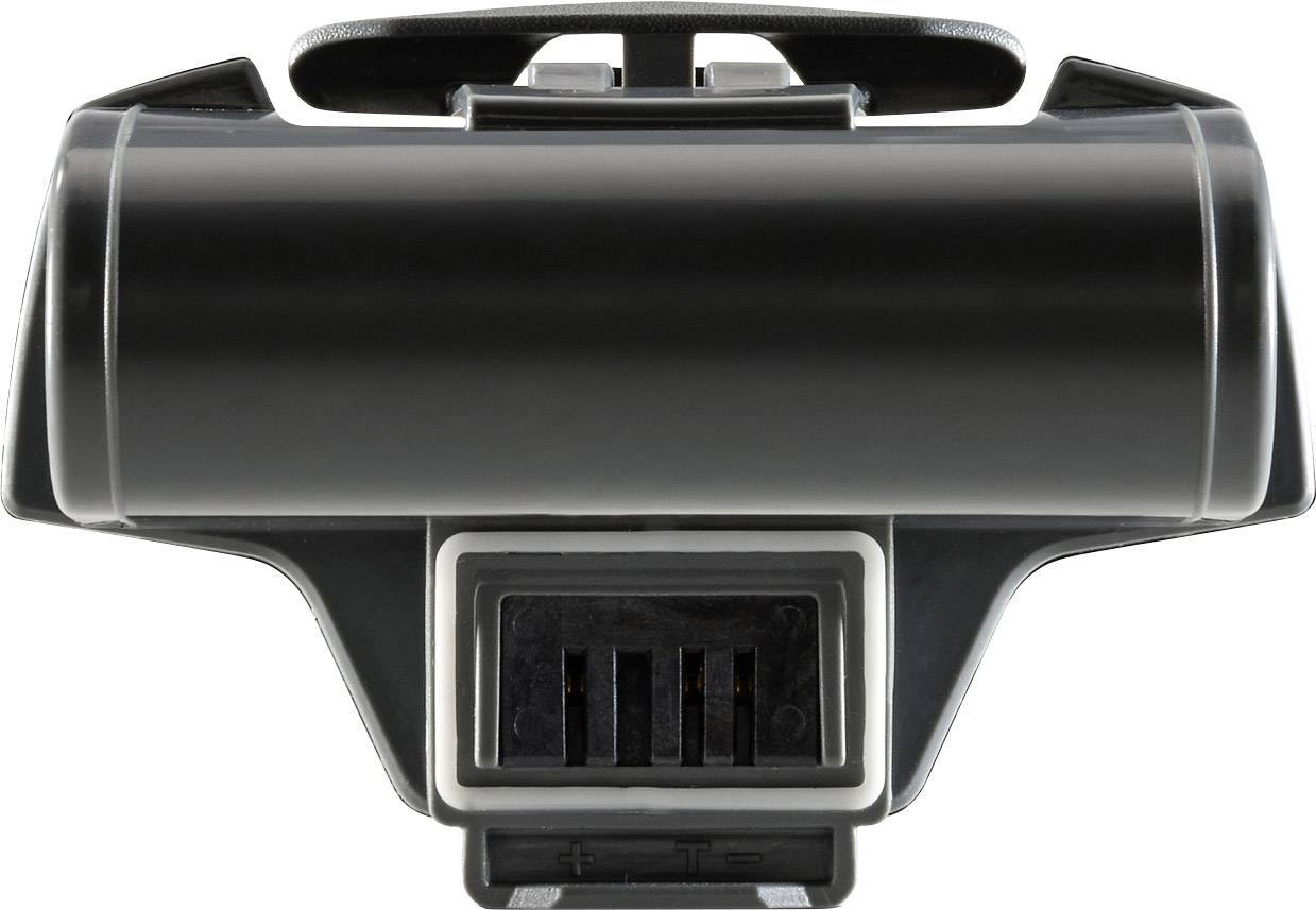 A black electronic component, likely a battery holder or electrical connector, with multiple plug connections at the bottom.