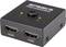 A HDMI switcher labelled 'SPEAKA PROFESSIONAL', with two HDMI ports and a button for switching inputs.