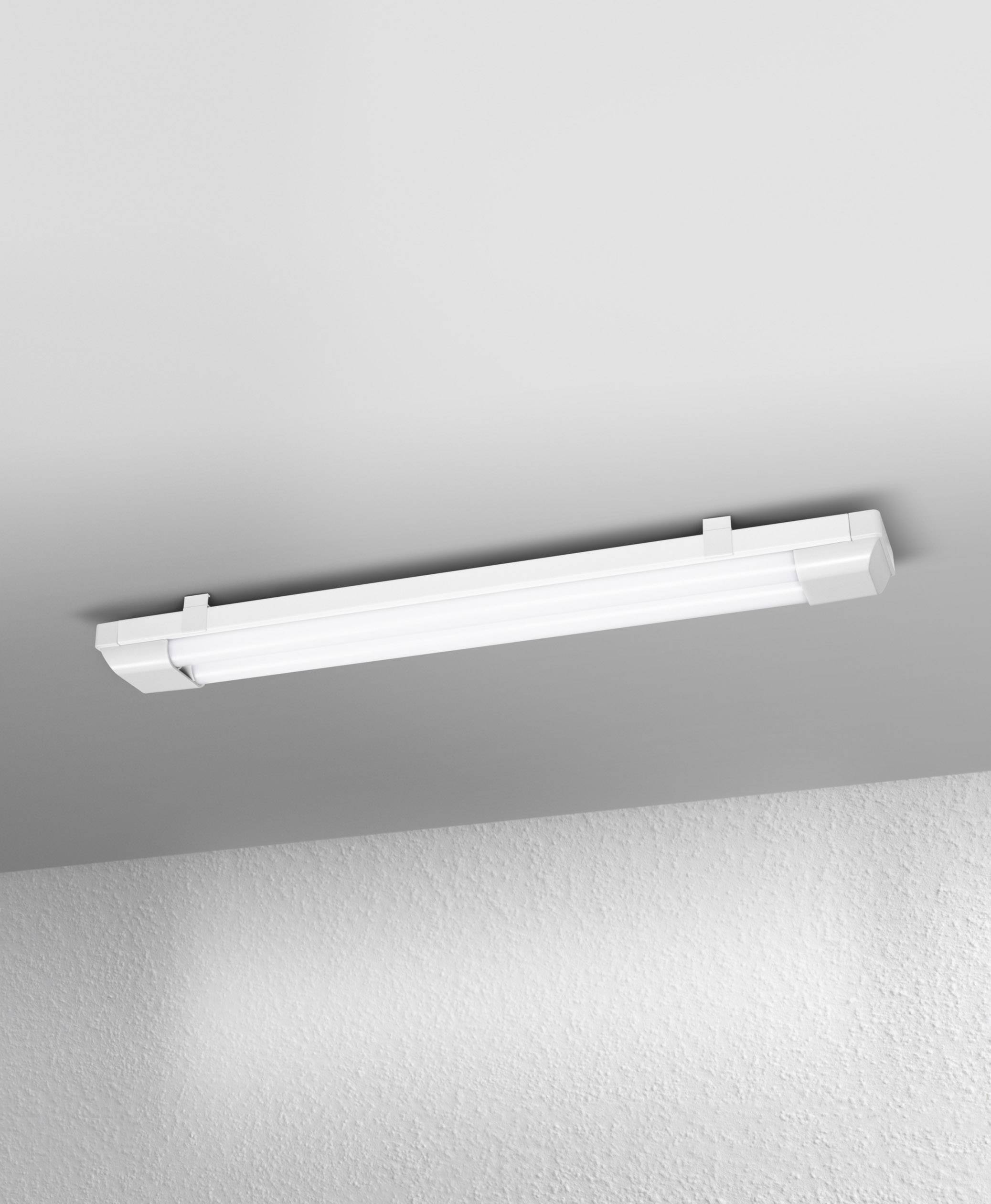 A rectangular white ceiling light mounted on a grey ceiling, illuminating the room evenly.