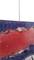 Close-up of a significantly enlarged artwork, predominantly featuring pink and blue colours, secured with a metal screw.