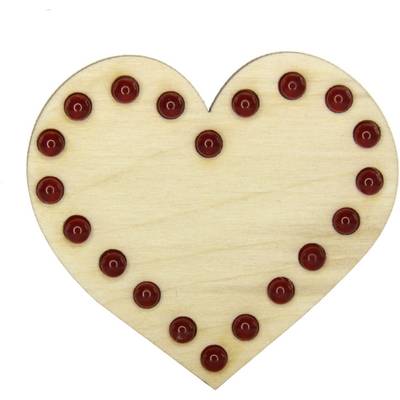 Wooden heart with red dots evenly spaced and decoratively arranged along the edge.