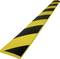 A yellow and black warning stripe, diagonally striped, used to mark hazard or safety areas.