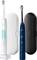 Electric toothbrushes in white and blue with charger and two travel cases. Perfect for dental care while travelling.