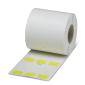 A roll of self-adhesive labels, partially unrolled, shows yellow markings on a white background.