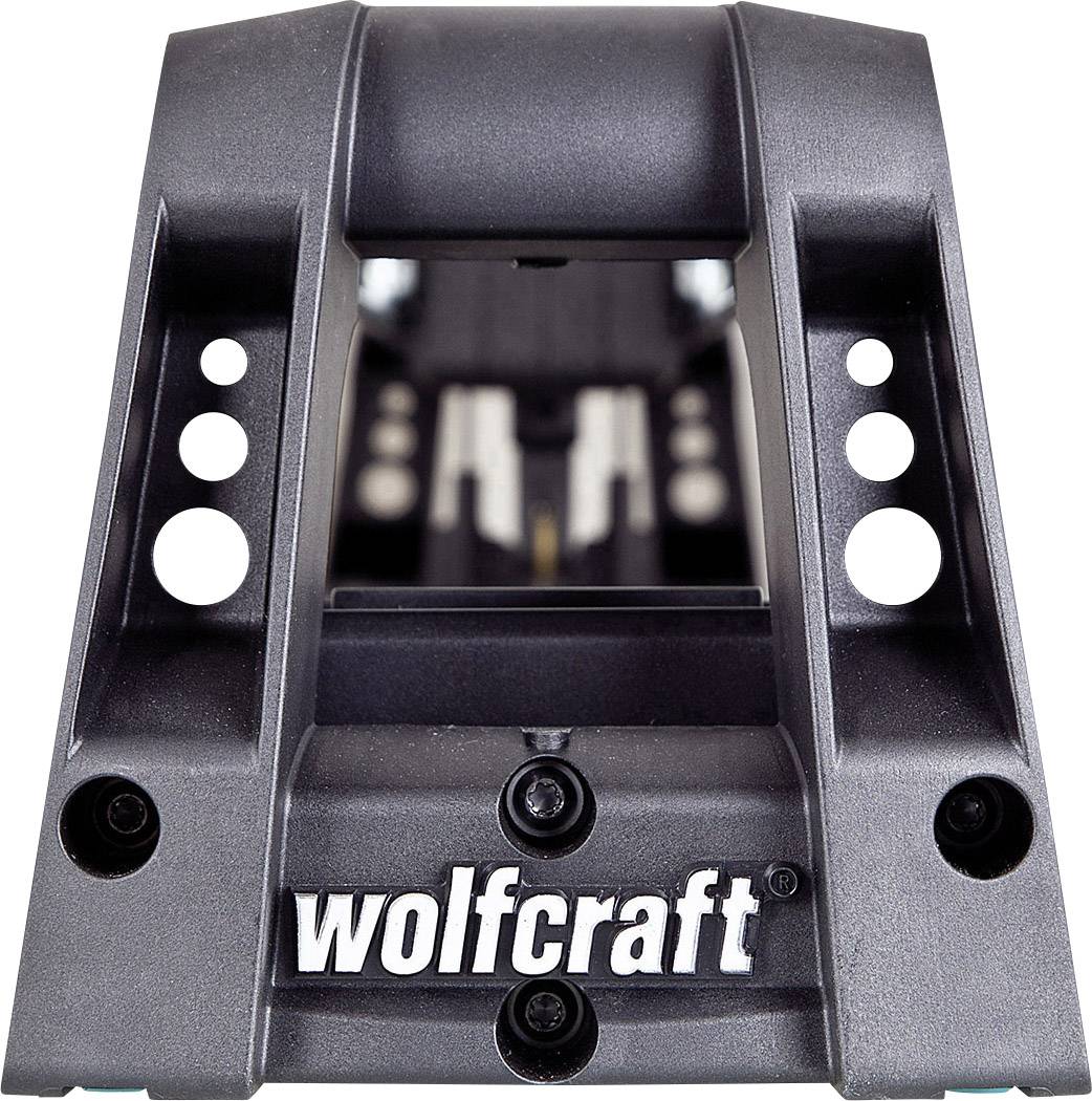 A black, compact angle holder by Wolfcraft, with multiple drill holes, suitable for assembly and DIY tasks.