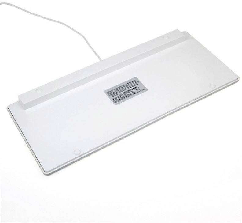 A white keyboard or electronic device base with a label in the centre and a cable outlet on the left side.